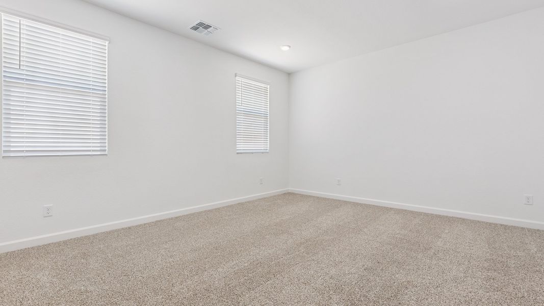 Spacious, unfurnished interior of a new home in Zanjero Pass, Waddell (Image 19).