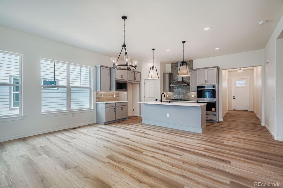 Furnished interior view inside a new home in Hilltop 55+ at Inspiration 55s, Aurora (Image 9).