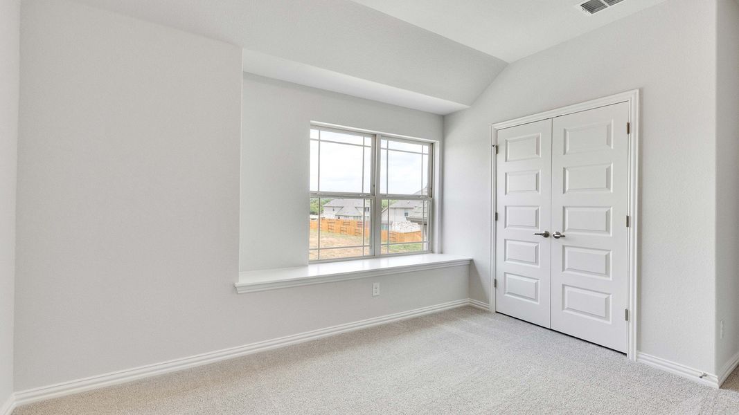 Furnished interior view inside a new home in Oaks at San Gabriel, Georgetown (Image 35).