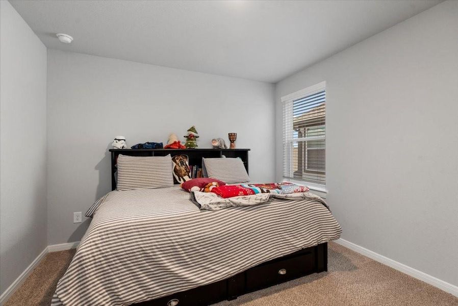 Furnished interior view inside a new home in The Grand Prairie 40’, Hockley (Image 16).