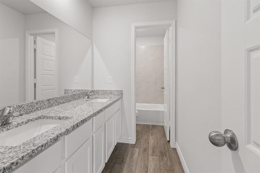 Furnished interior view inside a new home in Retreat at Fossil Creek, Fort Worth (Image 8). Furnished interior view inside a new home in Retreat at Fossil Creek, Fort Worth (Image 8).