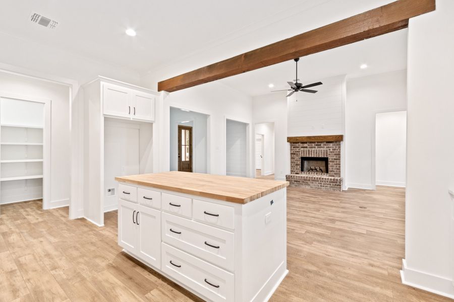 Representative furnished interior of a home built from the The Charlotte by Manuel Builders in Chapel Bend, Montgomery (Image 12).