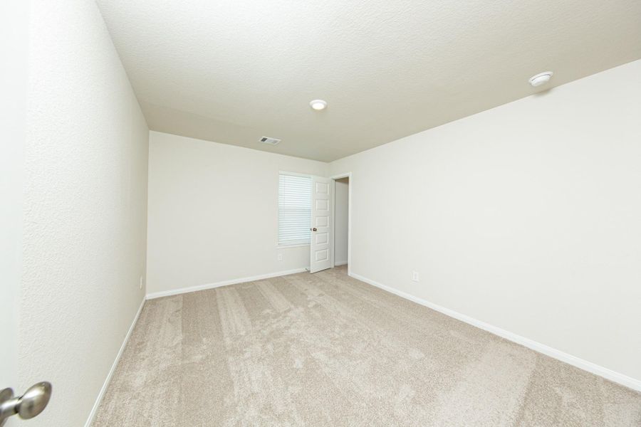 Spacious, unfurnished interior of a new home in River's Edge, Conroe (Image 22). Spacious, unfurnished interior of a new home in River's Edge, Conroe (Image 22).