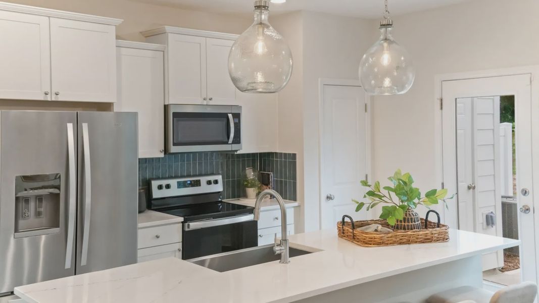 Furnished interior view inside a new home in Essex Townes, Franklinton (Image 12).