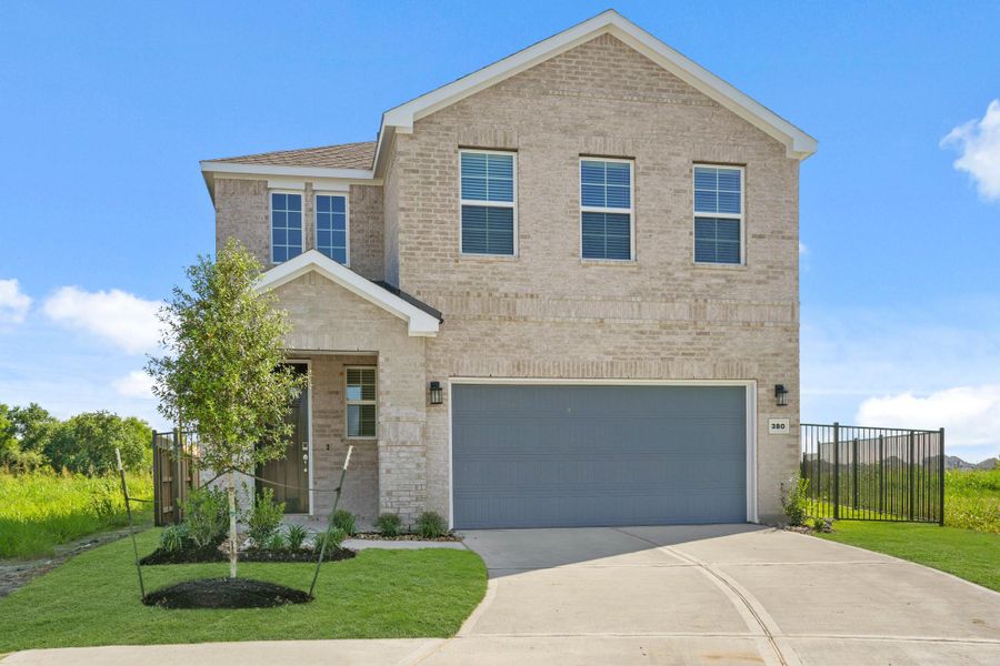 Front exterior of a new home in River Ranch Trails, Dayton, TX, highlighting curb appeal (Image 17). Front exterior of a new home in River Ranch Trails, Dayton, TX, highlighting curb appeal (Image 17).