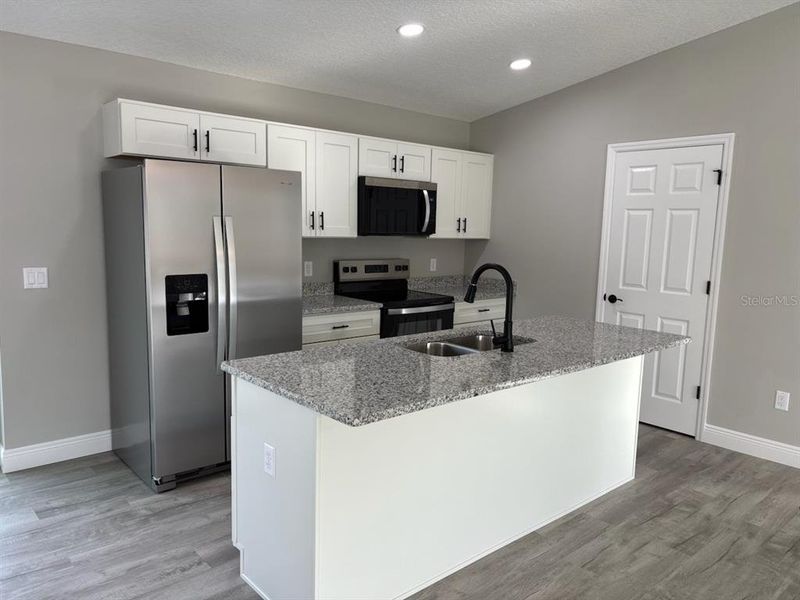 Furnished interior view inside a new home in , Citrus Springs (Image 8).