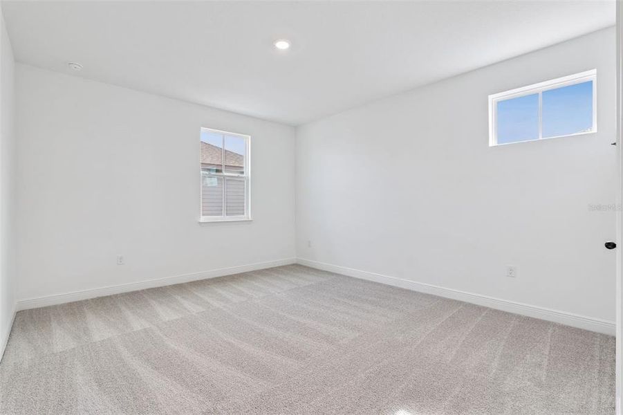 Spacious, unfurnished interior of a new home in Laureate Park (Craft Homes), Orlando (Image 28).