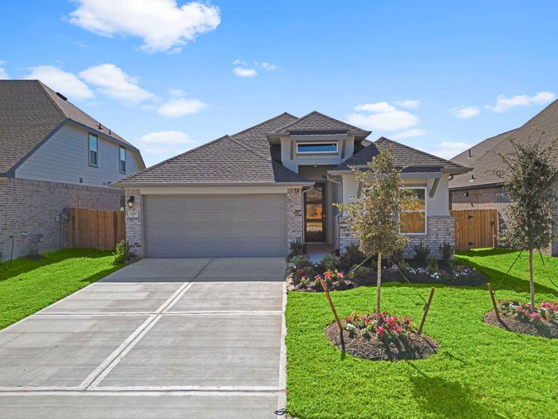 Front exterior of a new home in , Spring, TX, highlighting curb appeal (Image 1). Front exterior of a new home in , Spring, TX, highlighting curb appeal (Image 1).