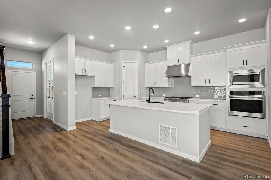 Furnished interior view inside a new home in Revel Crossing at Wolf Ranch – The Outlook Collection, Colorado Springs (Image 17).