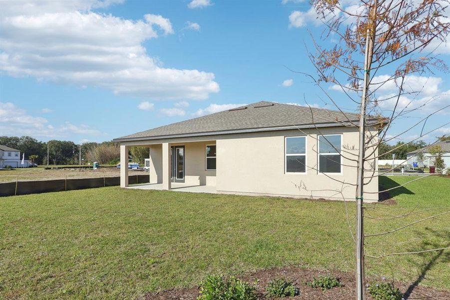 Exterior details and patio area of a home in Tyson Reserve, St. Cloud (Image 3). Exterior details and patio area of a home in Tyson Reserve, St. Cloud (Image 3).