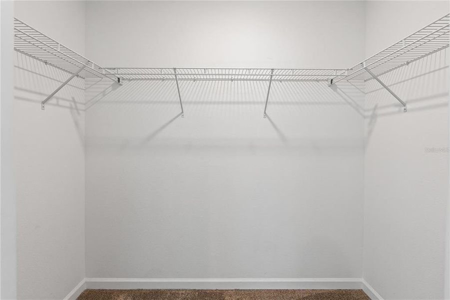 Spacious, unfurnished interior of a new home in Storey Creek: Manor Collection, Kissimmee (Image 22).