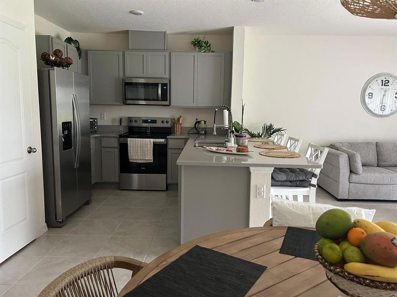 Furnished interior view inside a new home in , Davenport (Image 6).