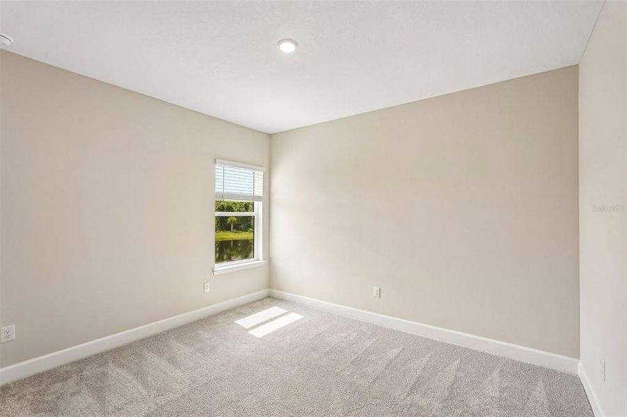 Spacious, unfurnished interior of a new home in Tiburon, Nokomis (Image 32).