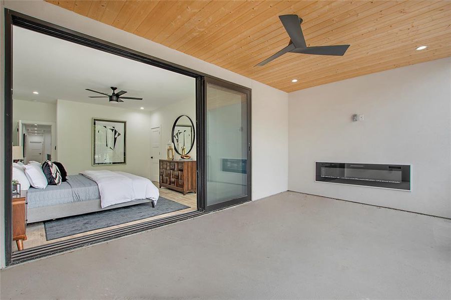 Bedroom with wood ceiling and ceiling fan