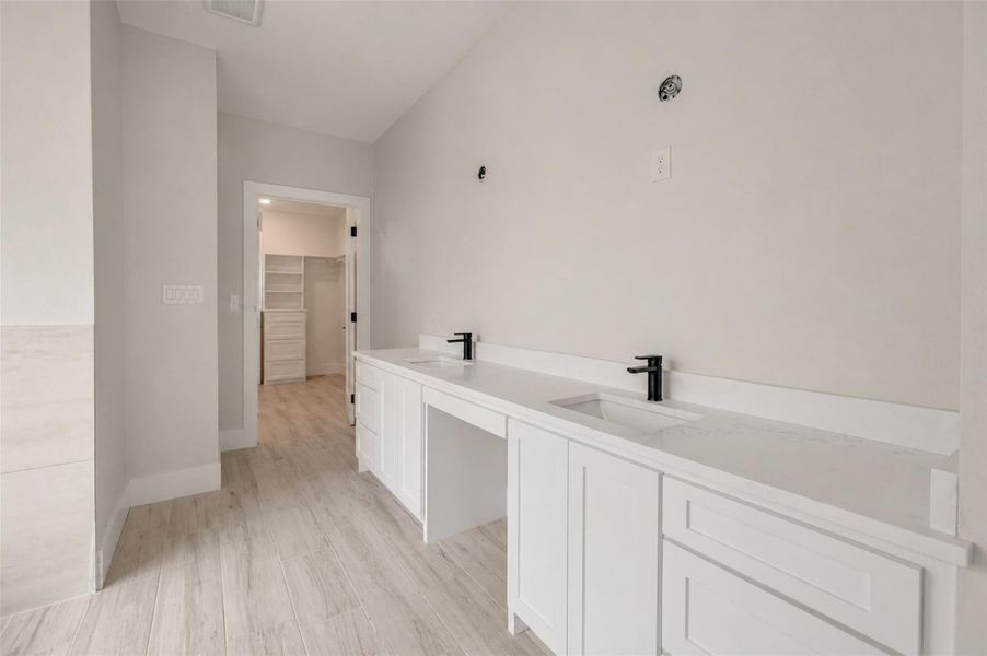 Furnished interior view inside a new home in , College Station (Image 18).