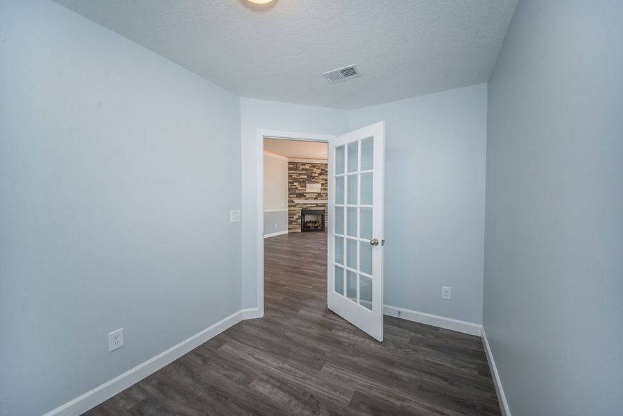 Representative unfurnished interior of a home built from the Franklin by Enchanted Homes in Guadalupe Heights, Seguin (Image 32).