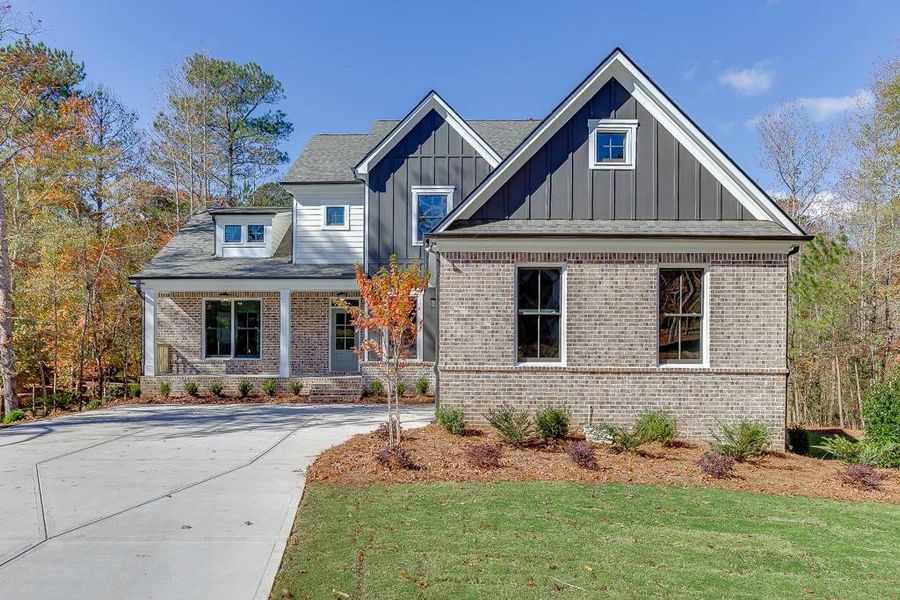 Front exterior of a new home in , Bishop, GA, highlighting curb appeal (Image 1).