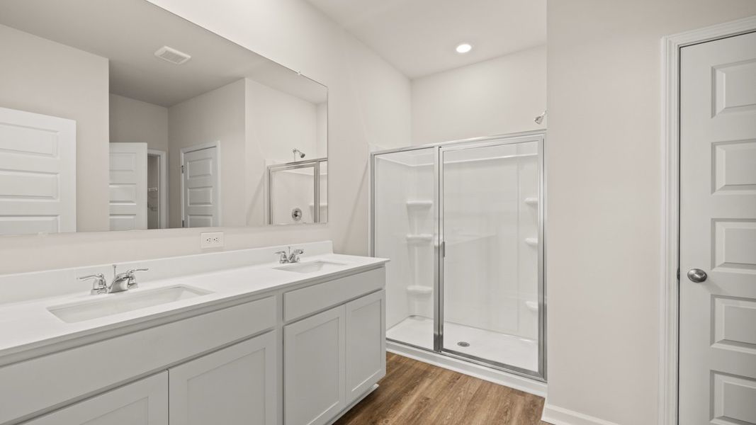 Furnished interior view inside a new home in Oakchase at Hampton, Hampton (Image 8).