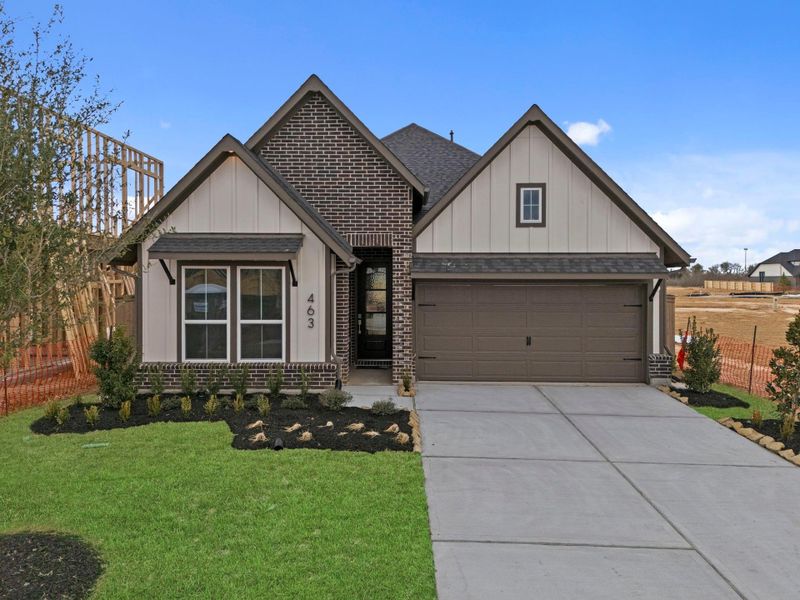 Front exterior of a new home in Grange 45', Katy, TX, highlighting curb appeal (Image 2). Front exterior of a new home in Grange 45', Katy, TX, highlighting curb appeal (Image 2).