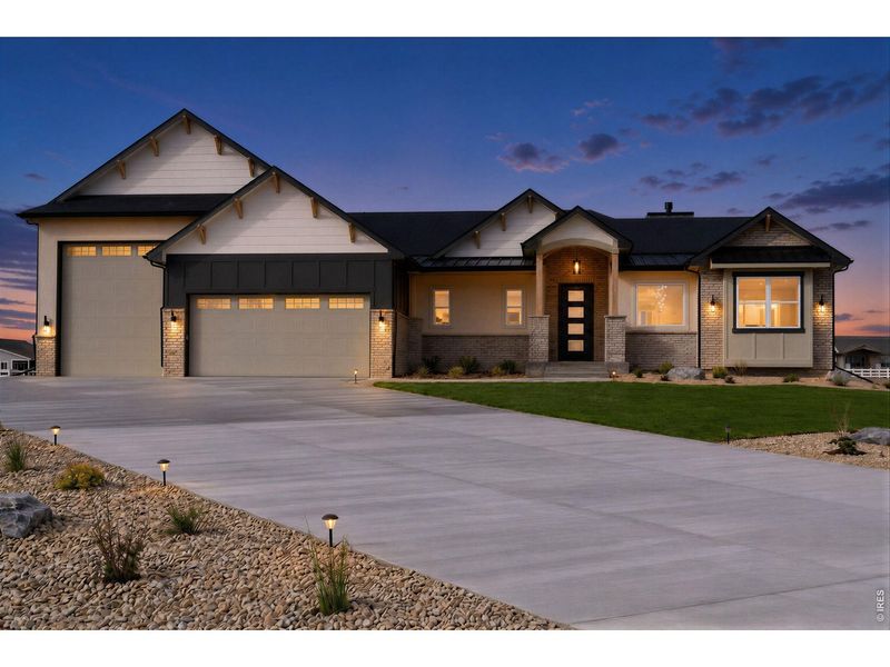 Front exterior of a new home in , Severance, CO, highlighting curb appeal (Image 2). Front exterior of a new home in , Severance, CO, highlighting curb appeal (Image 2).