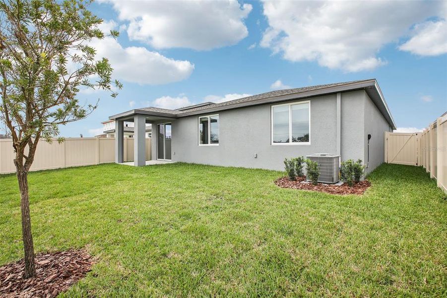 Exterior details and patio area of a home in Two Rivers - Classic Series, Zephyrhills (Image 22).