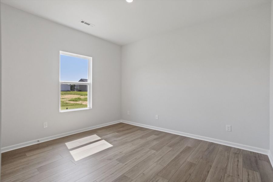 Spacious, unfurnished interior of a new home in Cambridge Reserve, Angier (Image 15).