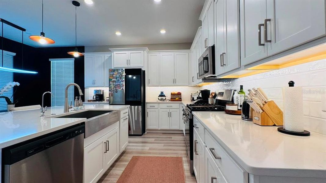 Furnished interior view inside a new home in Harvest at Ovation, Winter Garden (Image 14).