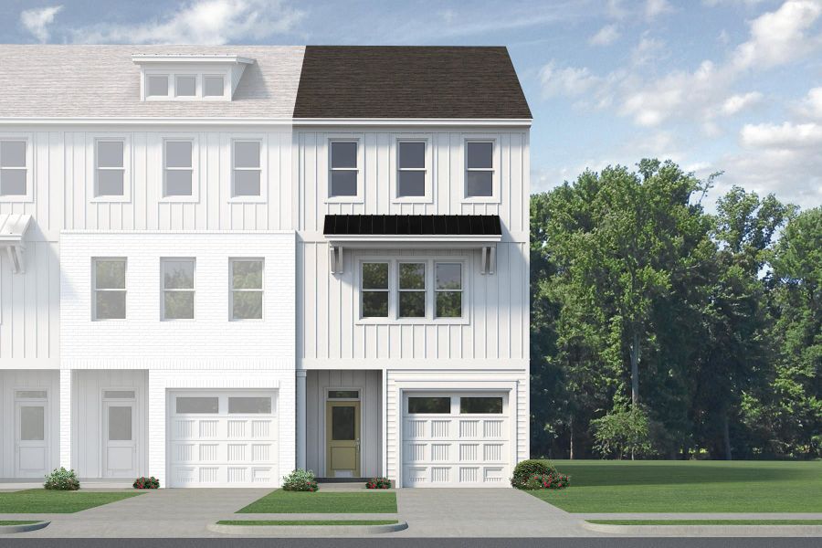 Front exterior of a new home in Anchors Bend Townes, Wilmington, NC, highlighting curb appeal (Image 26). Front exterior of a new home in Anchors Bend Townes, Wilmington, NC, highlighting curb appeal (Image 26).