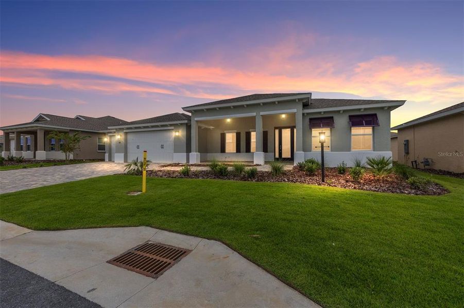 Front exterior of a new home in On Top of the World Communities, Ocala, FL, highlighting curb appeal (Image 14).