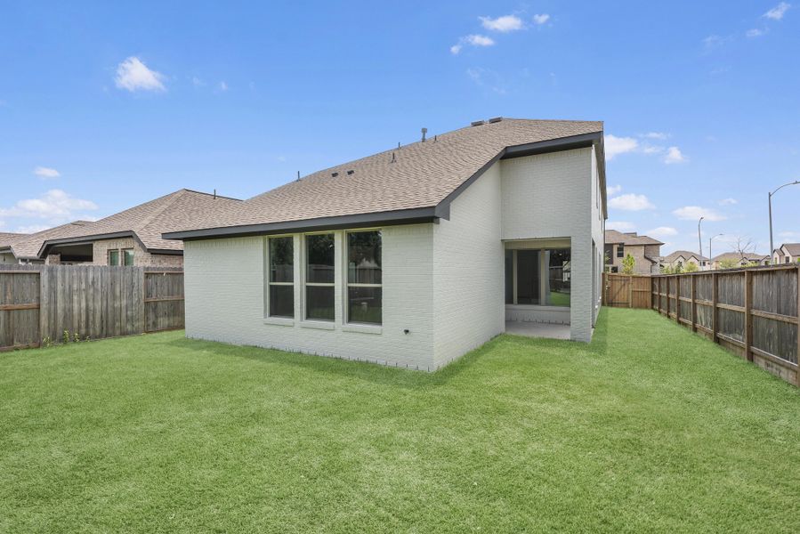 Exterior details and patio area of a home in Candela, Richmond (Image 4). Exterior details and patio area of a home in Candela, Richmond (Image 4).