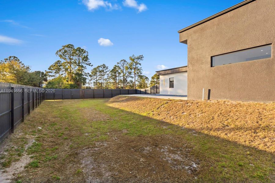 Exterior details and patio area of a home in , Lehigh Acres (Image 25).