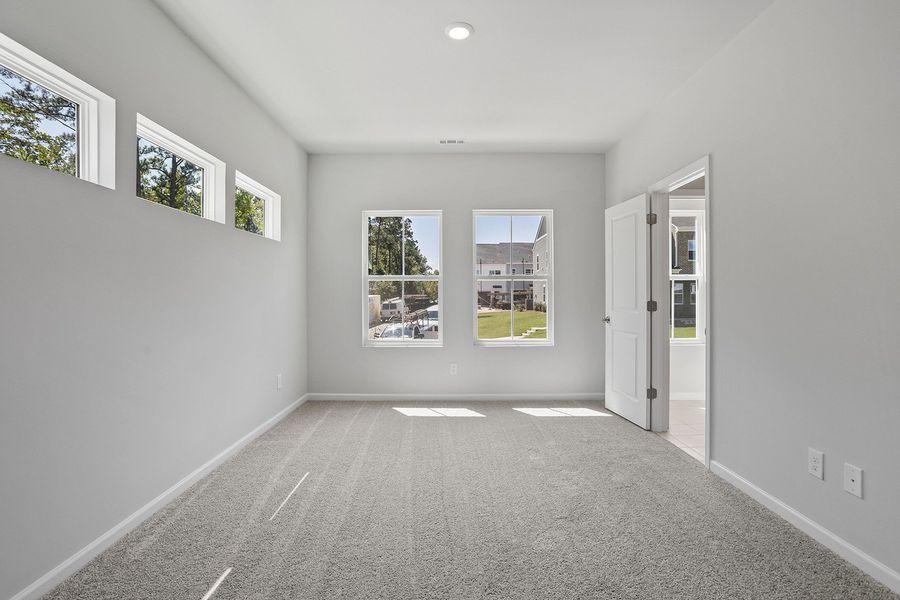 Spacious, unfurnished interior of a new home in Renaissance at White Oak, Garner (Image 16). Spacious, unfurnished interior of a new home in Renaissance at White Oak, Garner (Image 16).