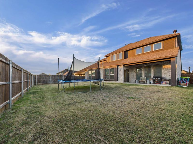 Exterior details and patio area of a home in , Ponder (Image 3).