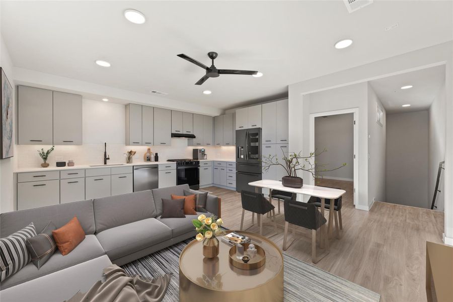 Living room featuring light wood finished floors, a ceiling fan, recessed lighting, and baseboards