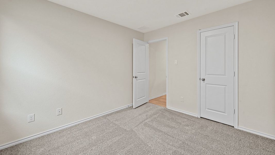 Spacious, unfurnished interior of a new home in Stonewyck Farms, Ennis (Image 31).