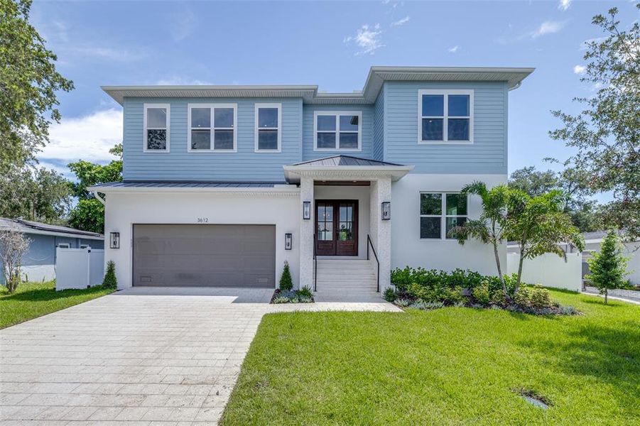 Front exterior of a new home in , Tampa, FL, highlighting curb appeal (Image 29).