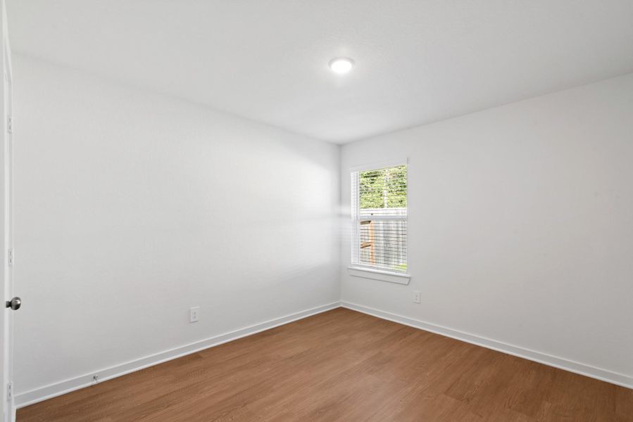 Spacious, unfurnished interior of a new home in Pinewood at Grand Texas, New Caney (Image 8).