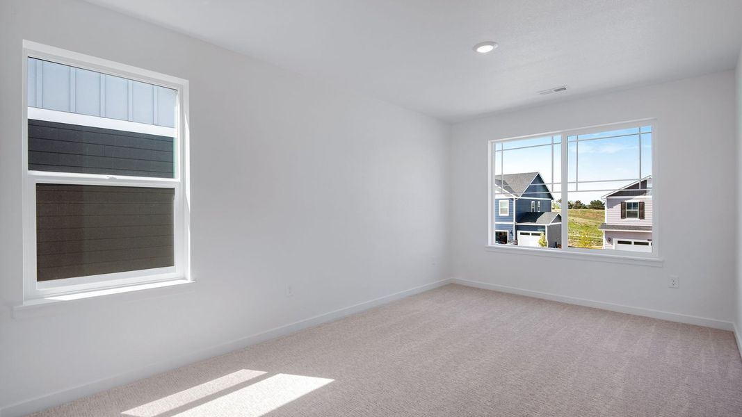 Spacious, unfurnished interior of a new home in Trails at Crowfoot, Parker (Image 37).