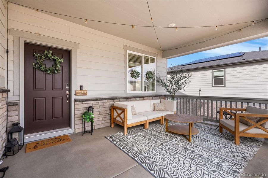Exterior details and patio area of a home in Poudre Heights: The Alpine Collection, Windsor (Image 3).