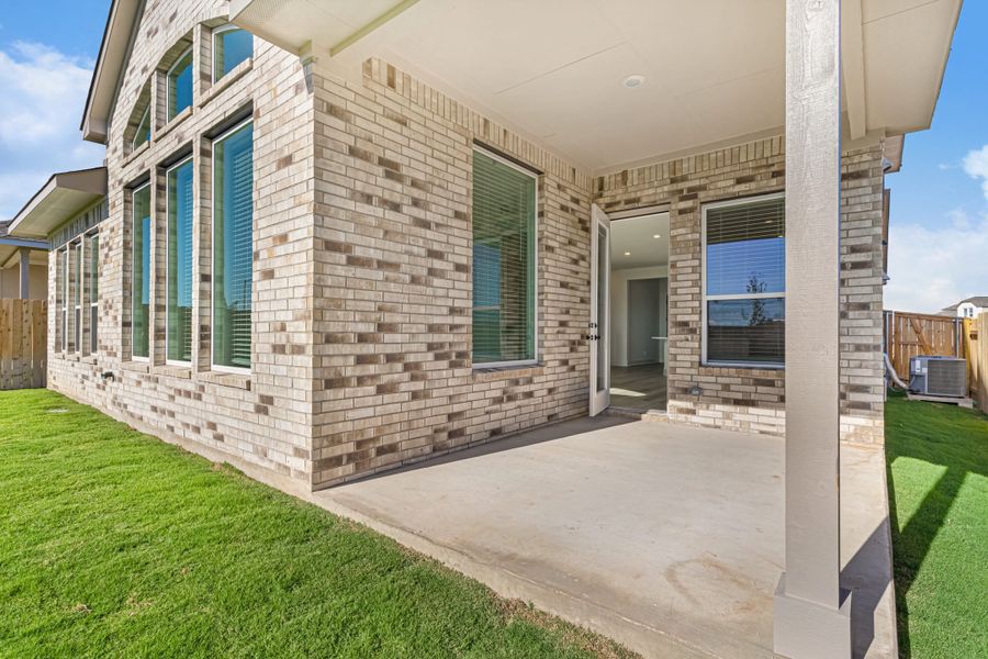Exterior details and patio area of a home in Parkside on the River, Georgetown (Image 31). Exterior details and patio area of a home in Parkside on the River, Georgetown (Image 31).
