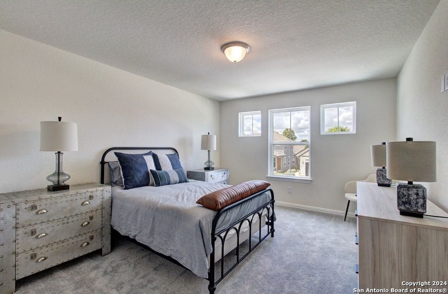 Furnished interior view inside a new home in Casinas at Gruene, New Braunfels (Image 7).