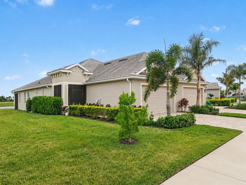 Front exterior of a new home in , Parrish, FL, highlighting curb appeal (Image 15).