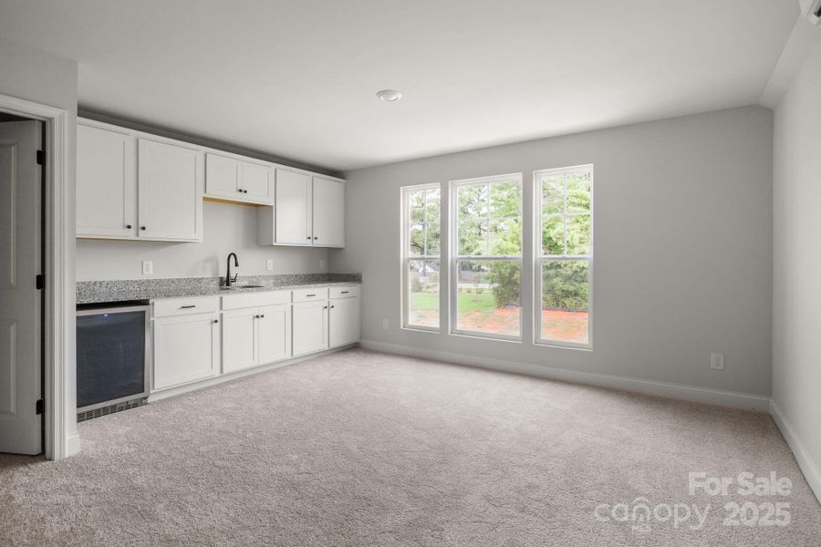 Finished bonus above garage. Includes full bath, wet bar with bath, beverage fridge and walk in closet. Finished bonus above garage. Includes full bath, wet bar with bath, beverage fridge and walk in closet.