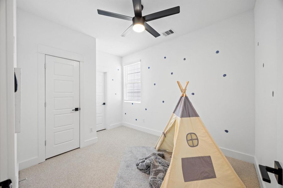 Secondary bedroom located on the second floor with jack & jill bathroom. Secondary bedroom located on the second floor with jack & jill bathroom.