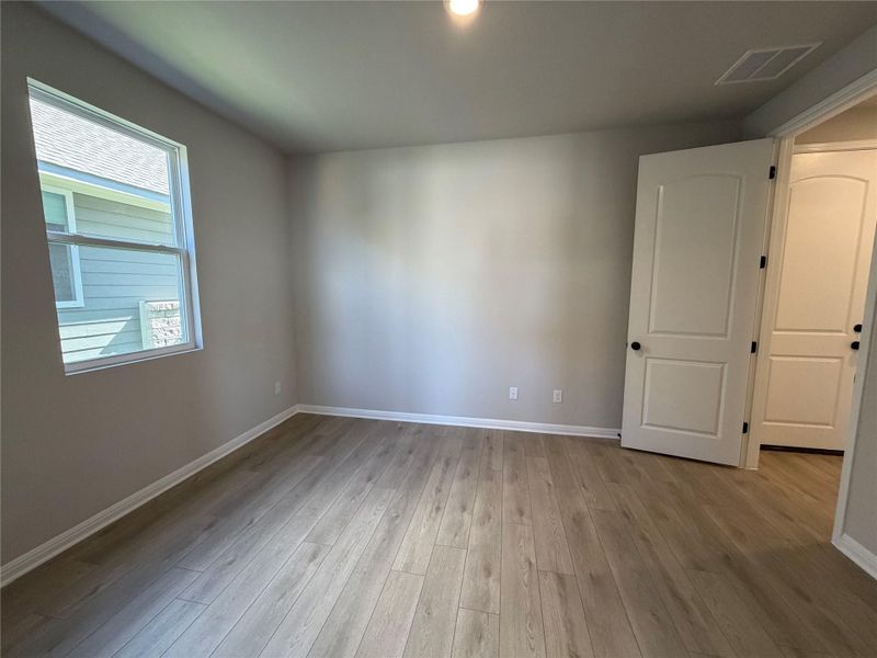 Spacious, unfurnished interior of a new home in Cannon Ranch 40s, Dripping Springs (Image 21).