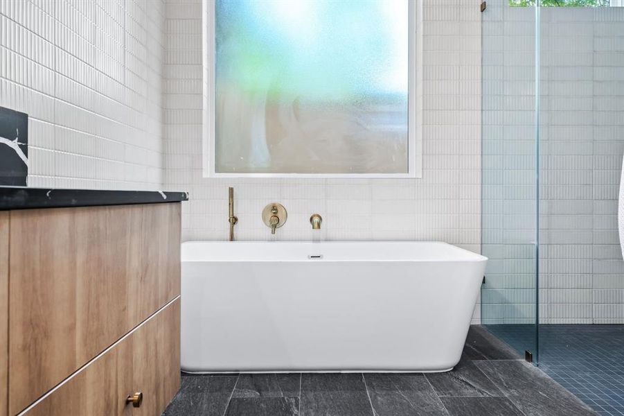 Separate soaking tub