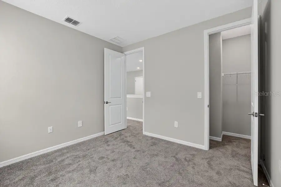 Spacious, unfurnished interior of a new home in Firethorn, Parrish (Image 18).