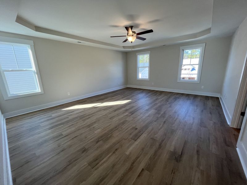 Spacious, unfurnished interior of a new home in River Tide Farms, Bolivia (Image 23).