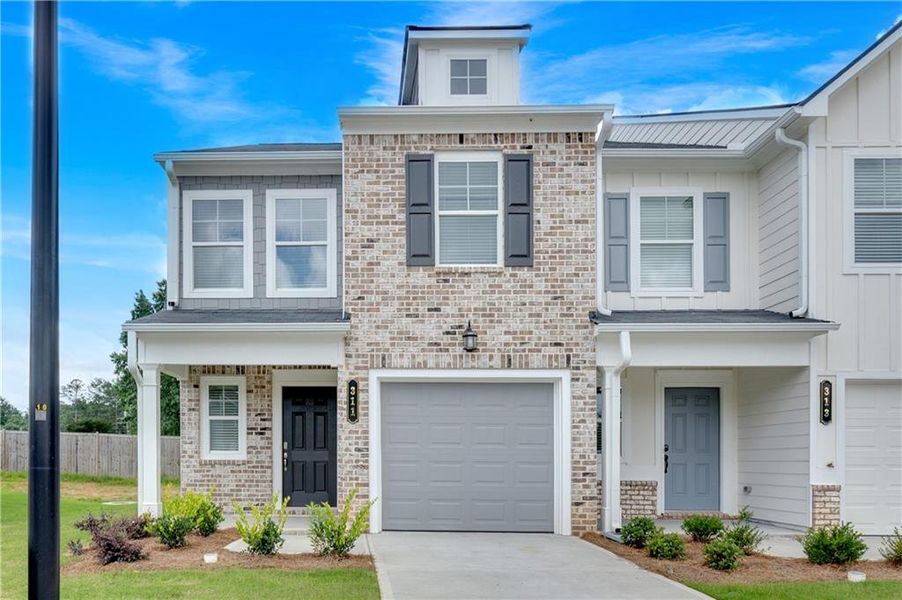 Front exterior of a new home in Village Green, Adairsville, GA, highlighting curb appeal (Image 2).