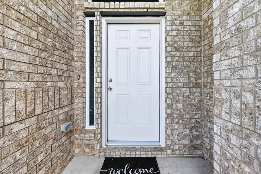 Exterior details and patio area of a home in Grand Magnolia, Magnolia (Image 24).